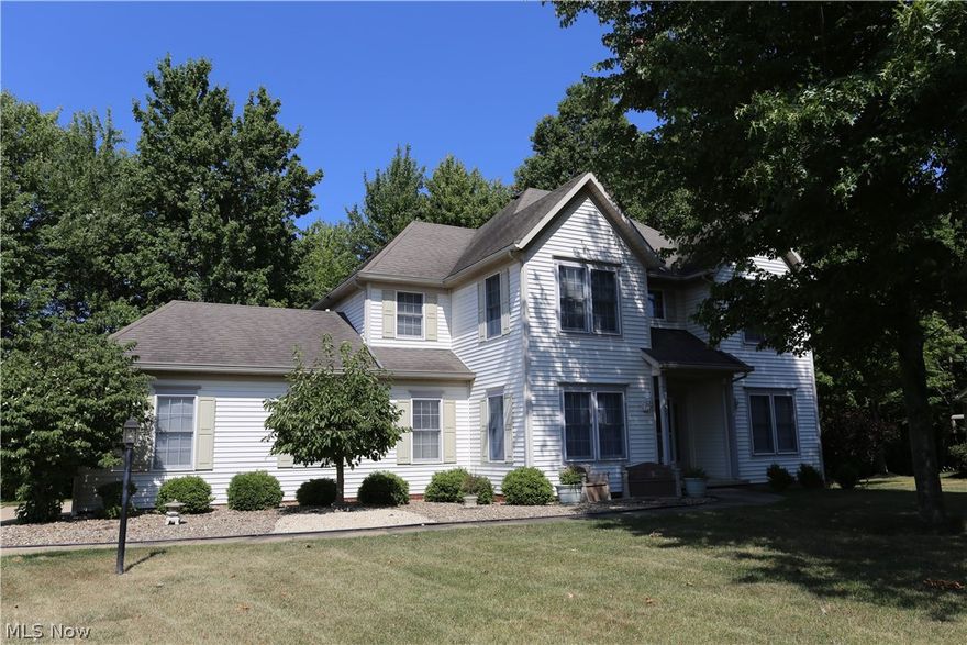 Ready to move to Hudson? Want to spend under $300,000? You've got it! Here'a a fantastic, priced to sell, move-in ready home with Hudson schools, nearly 3/4 acre lot, bedrooms all on the same floor, 3.5 baths, first floor laundry, first floor office, gas log fireplace with remote, finished basement with full bath, side load garage, deck, hardwood floors on first floor, master bedroom with ensuite bath including luxury tub, shower, double sinks and vaulted ceilings, just to name a few amenities! Located on a quiet street with a quiet train in the wooded backyard. Yes - we said quiet. No blaring horns, just the gentle sound of locomotives bringing you warm memories...which also will save you thousands over similar properties in Hudson! Comstock quality built home with great floorplan, neutral decorating (and no wallpaper!) and spacious bedrooms. Hudson is a lovely place to live, filled with charm, desirable schools and much community involvement. Home warranty for your peace of mind. Eas