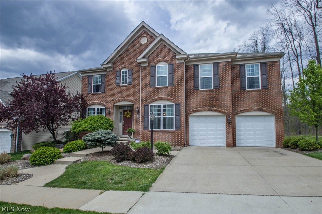 This former Drees Model Home is full of all the upgrades. Walking into this home, you will immediately notice the impressive 20ft ceilings in the foyer and family room. With over 2900 sq ft and an additional 900 sq ft in the finished basement, this home boast over 3800 sq ft of living space. The open floor plan and many large windows, create a floor plan to be desired. The first floor boasts a large eat-in kitchen, formal dining room, living room, and beautiful two story family room with fire place. Upstairs you will find 3 nicely sized bedrooms, as well as, an impressive master's suite with vaulted ceilings, a beautiful bath with double sinks and walk-in closet. The finished basement, with theater area, is a great place for family and friends to gather to watch a movie or a game. The rec room is an area to play pool, foosball or turn into a kids play area. Also included in the basement, is a full bath and plenty of extra room for storage. Enjoy the beautifully landscaped yard, backed