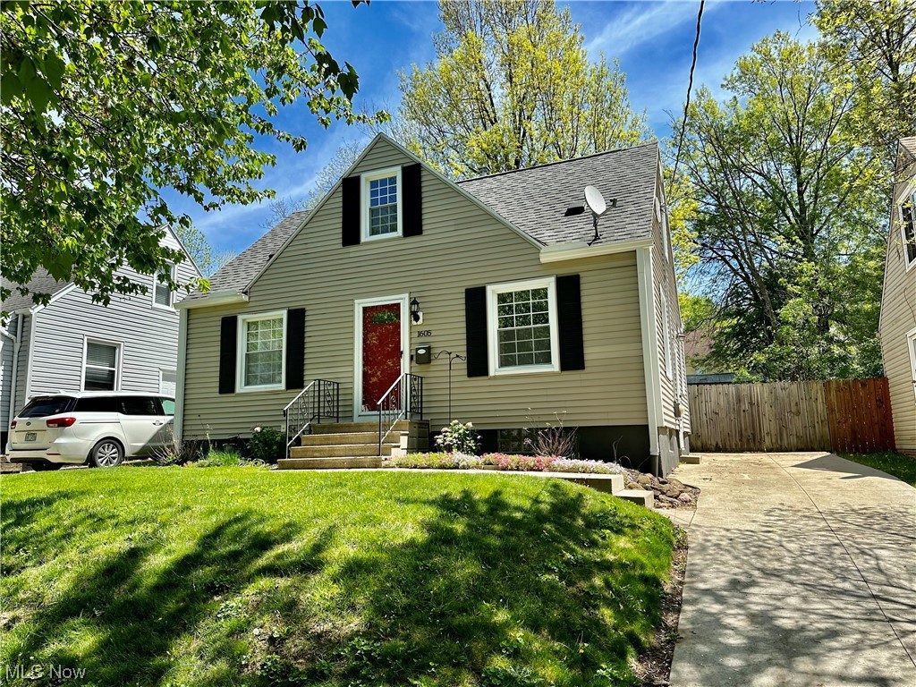 Absolutely charming home on a lovely residential street in Firestone Park! Better than your typical cape with a very large updated open kitchen with dining area, and French doors out to the private, fully fenced back yard. The first floor offers 3 bedrooms, one would be a perfect office or nursery! Updated first floor bathroom. Large bedroom on the second floor. Additional updates include remodeled kitchen, replacement windows throughout, vinyl siding, A/C less than a year old, new carpet in bedroom, new dishwasher in 2022, water tank in 2015, new concrete drive poured in 2015, updated electric with added receptacles in basement, and updated plumbing including exterior spigot and utility sink. Dont miss this one!