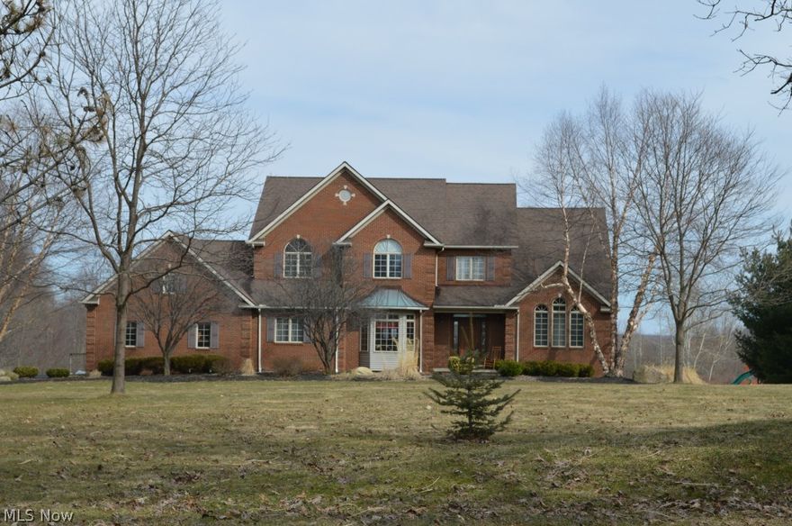 You won't want to miss this pristine 5 bedroom colonial on a beautiful lot! As you enter the 2-story foyer, you will be welcomed by the two-way stone fireplace in the office/living room. The spacious formal dining room will allow you to host and entertain many events. Turning the corner, you will be attracted to the wood floors throughout the kitchen and eat-in area. The gourmet kitchen boasts quartz counters, beautiful back splash and upgraded appliances. Enjoy the beautiful view of the green space from this area as well. The first floor is home to an additional living suite with a full bathroom, spacious laundry room and large closet area. The second floor is home to the vaulted ceilings and picture-view windows in the master bedroom and grand master bath. You will follow the path through the lengthy hallway to an additional bathroom and three bedrooms. The two front bedrooms have vaulted ceilings as well.  Dream about how you can finish this full basement and make it your additional