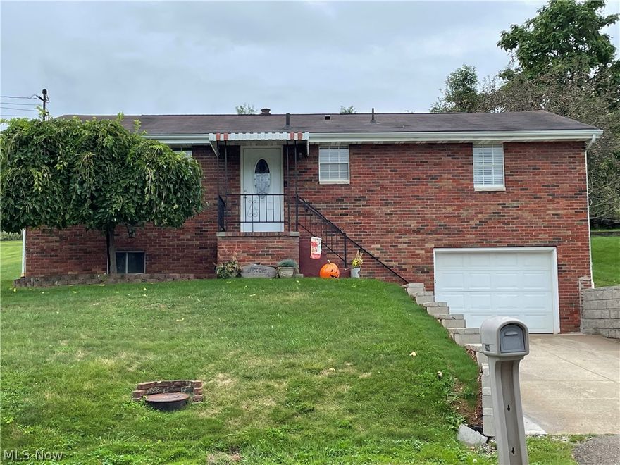 Nestled in the hillside on 27th Ave on a double city lot sits an adorable raised ranch. On the main floor there are two larger bedrooms, updated kitchen accents with stainless appliances, updated bathroom, a dining area in the back corner, and a large living room. The stairs lead down to the laundry/utility room, a second full bathroom, and an additional living area that can be multipurpose as a third bedroom with the beginning of a kitchenette/rec room/etc. The single stall garage is tucked in giving extra space in the driveway for extra parking. The double lots are in length that makes for a generous sized yard with a slight sloping terrain to where you can transform into the best use that fits your needs. Conveniently located in South Parkersburg not far off Gihon Road. Set up your personal tour today.