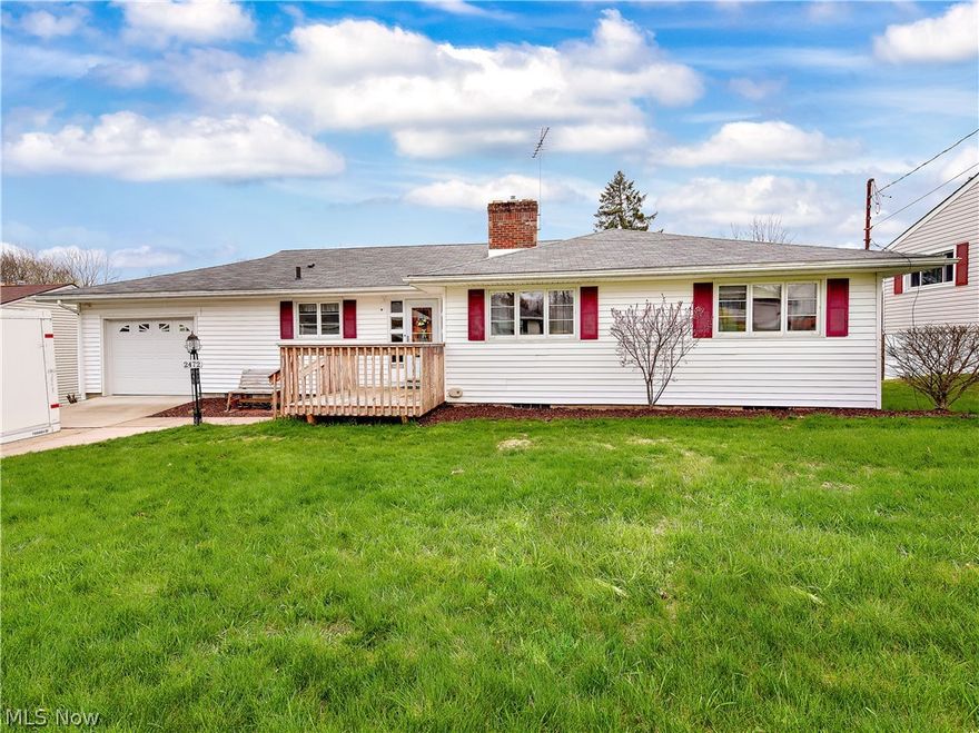 Coolridge subdivision of Ellet welcomes you to 2472 Benton Ave. A Lovely three bedroom two full bathroom spacious ranch style home with a charming open concept in great room dining area and kitchen, large picture windows that brought the sellers to this home will fill your days with a beautiful large yard and private wooded view... backing up to Hyre Park, nature trails connect to Lions park offering softball, football fields, basketball, tennis & shuffleboard courts, play, picnic areas and much more. This home also offers a walkout basement area that can be used for an in-law suite with kitchenette setup, a second full bath for convenience along with a work room and plenty of storage space. Lets not forget private access to the garage from the basement. Some newer windows in the home, updated kitchen and appliances, open stairs leading to lower level, bathroom, roof, furnace and water heater, insulation. We are taking offers!