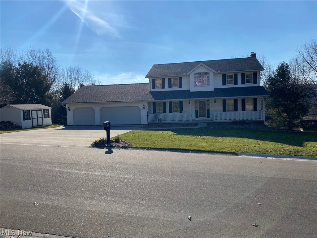 This is a spacious, beautiful, and quality built 2 story home located in a quiet neighborhood in Bolivar. Tuscarawas Valley School District. Conveniently located 15-20 minutes from New Philadelphia or Canton. Located on a nice size lot with approximately 0.7 acres. Updated features include kitchen with new appliances, dining room with custom built-in island and hutch, half bath, finished walkout basement, new air conditioner and furnace with humidifier, hot water heater, driveway, and roof. Additional features include a nice size 3 car attached garage, a 16 ft x 10 ft shed, office in basement, new carpet throughout, gas log fireplace, large deck with gazebo. and concrete patio.