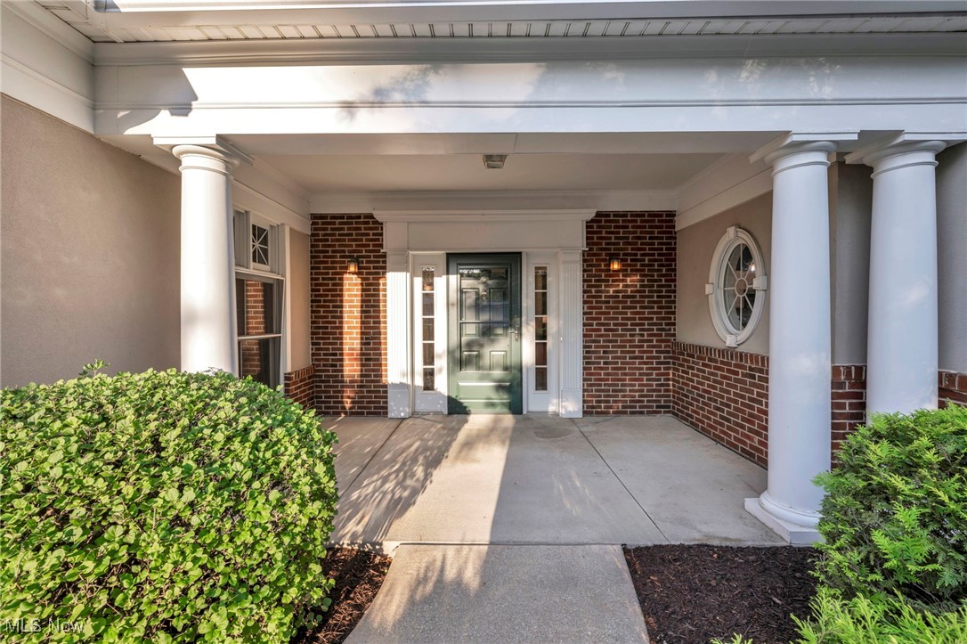 Welcome to this spectacular vaulted ranch-style condo in the highly desirable Athenian Village, a vibrant 55+ community known for its scenic setting and active lifestyle. This former model home is larger than most units in the association and has been thoughtfully updated throughout, offering style, space, and comfort in one level of easy living. Step inside to soaring vaulted ceilings and an open, airy floor plan that’s filled with natural light. The spacious living room features a vaulted ceiling, fireplace, neutral tones, and access to the fully enclosed patio. Home chefs will love the newly remodeled kitchen; all-stone countertops, modern cabinetry, and large pantry—perfect for storage and meal prep.This home features two generous bedrooms, including a primary suite with a walk-in closet and direct access to an updated full bath with stone counters and tasteful finishes. A second full bath is equally updated, ideal for guests or daily use. Each space has been carefully maintained and upgraded for lasting quality and comfort.Outdoor living is just as inviting, with a large front porch that’s perfect for morning coffee and a private enclosed patio ideal for relaxing, entertaining, or enjoying a book in peace. Whether you're indoors or outdoors, you’ll feel right at home. Additional conveniences include in-suite laundry, ample storage, and an attached garage. As a former model, this unit offers additional square footage and enhanced features not typically found in other condos within the community.Athenian Village offers beautifully landscaped grounds, a welcoming clubhouse,walking paths, and a scenic pond—all designed to promote connection, activity, and peaceful living. This is truly one of the finest units in the development—move-in ready and waiting for its next happy owner. Don’t miss your chance to own this exceptional home in one of the area’s most desirable 55+ communities. Schedule your private showing today!