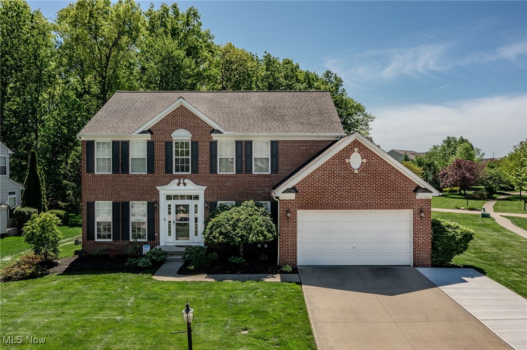 In the sought-after Hunt Club, this full-brick-front colonial checks every box for comfort, style, and function. Step into the two-story foyer and feel the openness right away. With four bedrooms, two full baths, and two half baths, the layout offers both space and flexibility. The first floor has been updated with newer LVP and carpet, flowing through a living room filled with natural light, a formal dining room with tray ceiling, and a dedicated office behind French doors. The kitchen is built for gathering, anchored by an expanded granite island and stainless appliances, and opens into a sunny morning room and large family room. Upstairs, the primary suite offers a deep walk-in closet and a private bath with ceramic title floors. Three more generously sized bedrooms offer ample storage and light. The finished basement is ready for everyday living or weekend entertaining. It includes a spacious rec room, half bath, and a fully installed wet bar that makes hosting a breeze. Outside, the park-like yard sits on a quiet dead-end street and is supported by a 9-zone irrigation system. A full tear-off roof was completed in 2010, and the home includes a sump pump with backup for extra peace of mind. Location is another win. You’re minutes from Crocker Park, Avon Commons, and just 20 minutes to downtown Cleveland or Hopkins Airport. This home blends location, layout, and upgrades in a way that’s hard to match. Come see what makes it feel like a standout from the moment you arrive.