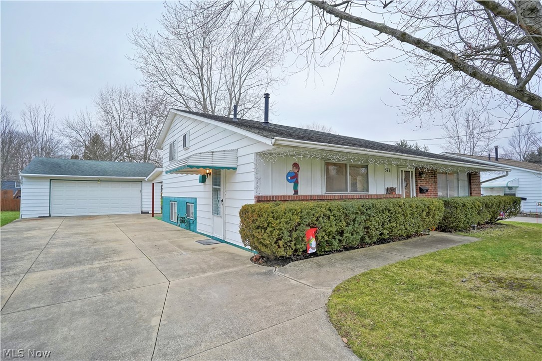 This is a value packed 3 Bedroom 2 full Bath home that is located in a preferred community. This is a unique split level floor plan with a large eat-in Kitchen and with all Bedrooms up and large walk-out family Room with utility area on Lower level and one of the full Baths. There's loads of natural light in living areas. The healthy sized back yard allows room to grow. There's a 2 car detached garage. All appliances will remain, including washer, dryer & freezer. Enjoy all that Munroe Falls has to offer including Parks and recreation. This home is convenient to highways, schools, including universities and is minutes to serious shopping.