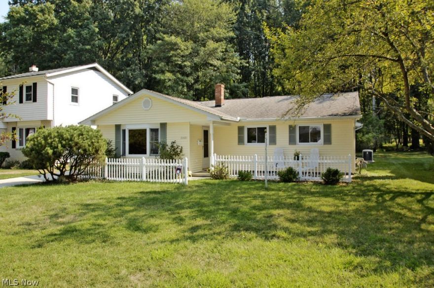 Charming Cape Cod Ranch!  Backs up to gorgeous, private park setting!  Nearly 2,000 square feet!  Meticulously maintained with pleasant colors!  Updated kitchen and baths!  Large addition provides for roomy family room with attractive brick, woodburning corner fireplace, small den / office and spacious four season room with skylights and a cheery wall of windows!  Cozy stamped patio at front of home enclosed with white picket fence!  Improvements over last ten years include: 40 year roof, siding, windows, concrete driveway, exterior doors and garage door with opener and keypad and more!  $10,000 whole house generator!  Minutes to Bleser Park, Pool and Lake Erie!