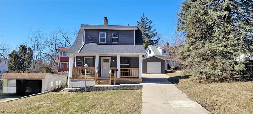 Beautifully updated 2 bedroom cape cod in the heart of Garfield Heights is waiting for it's new occupants!  Some updtes include, roof, windows, mechanicals, garage, front porch, flooring and more.  The new kitchen has a ton of natural light, there is a first floor half bath, there is a living and dining area that rounds out the main floor.  Upstairs has 2 bedrooms and a full updated bathroom.  There is a full basement and spacious front porch.  This is a Fannie Mae HomePath Property