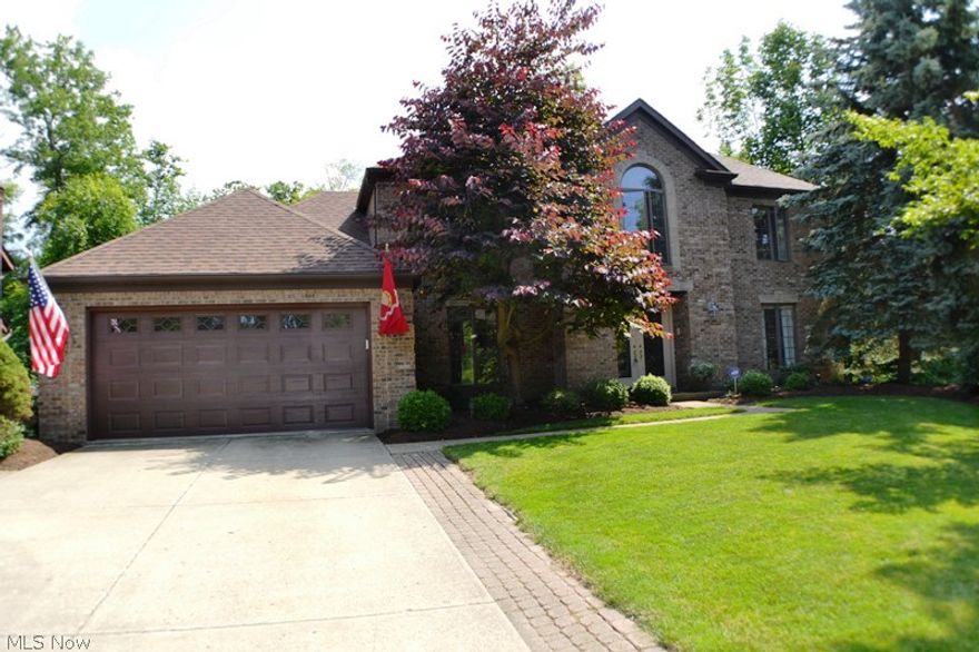 Spectacular Deerfield Woods family home on wonderful cul-de-sac!  Features include formal living and dining rooms, spacious family room with wood burning fireplace with gas starter, gourmet kitchen with snack bar, generous dining area, Bosch dishwasher, Kenmore range, ceramic tile floor, pantry, raised panel oak cabinets, and recessed lighting, fantastic master suite with coffered ceiling, double door entry, full bath with double culture marble vanities, whirlpool soaking tub, shower stall, and vaulted ceiling sitting room or fourth bedroom, two and one half total baths, Anderson windows, full basement, Aprilaire humidifier, crown molding, ceiling fans, large wood deck overlooks private rear yard backing to greenbelt, one year HMS Home Warranty and much more!