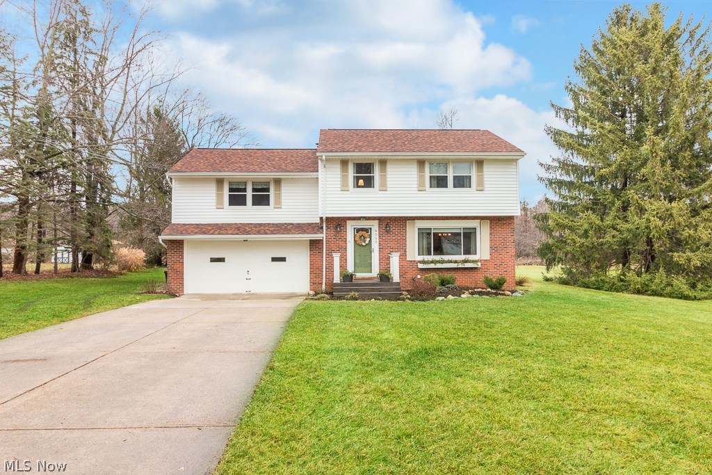 Move right in to this completely updated 4 bedroom colonial home situated on a picturesque 2.6 acre lot conveniently located just 1 minute from highway access & in the Brecksville school district. No detail has been overlooked starting with the renovated kitchen featuring Kraftmaid cabinets, granite counters, tile floors & stainless appliances. Refinished hardwood floors, new interior doors, 6” baseboards with new door & window casings have been added throughout. French doors off dining room lead to a cozy family room featuring a wood burning fireplace which steps out onto wood deck & stamped concrete patio. Updated full bath with new vanity, tile floors, updated tub & surround. The spacious bedroom layout of this home allows it to be used as a 4 bedroom or 3 bedroom with 2nd floor family/play room. Additional features & updates of this home include; new fixtures, new vinyl windows 2012, newer furnace, AC 2015, updated electric panel, complete tear off roof & new gutters 2014; A