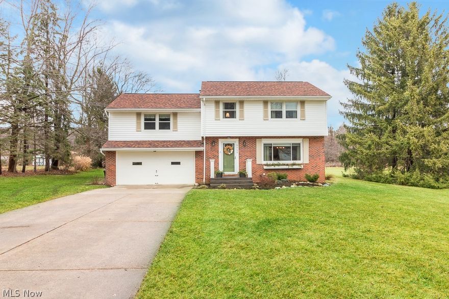 Move right in to this completely updated 4 bedroom colonial home situated on a picturesque 2.6 acre lot conveniently located just 1 minute from highway access & in the Brecksville school district.  No detail has been overlooked starting with the renovated kitchen featuring Kraftmaid cabinets, granite counters, tile floors & stainless appliances.  Refinished hardwood floors, new interior doors, 6” baseboards with new door & window casings have been added throughout.   French doors off dining room lead to a cozy family room featuring a wood burning fireplace which steps out onto wood deck & stamped concrete patio.  Updated full bath with new vanity, tile floors, updated tub & surround.  The spacious bedroom layout of this home allows it to be used as a 4 bedroom or 3 bedroom with 2nd floor family/play room.  Additional features & updates of this home include; new fixtures, new vinyl windows 2012, newer furnace, AC 2015, updated electric panel, complete tear off roof & new gutters 2014; A