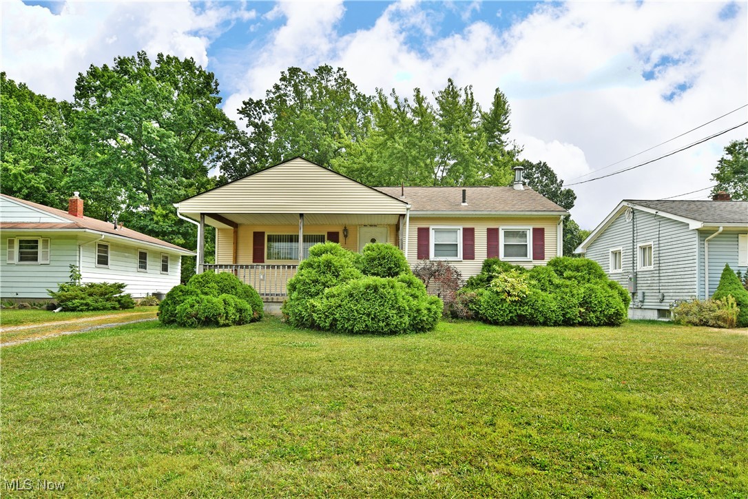Here’s your chance to realize the huge potential and fantastic package presented by this move-in-ready Niles residence! A perfect place for those looking for a little extra storage space and a traditional, three-bedroom ranch layout; this home checks all the right boxes. Tucked away in a quiet neighborhood just minutes from local shopping districts, this charmer peers out from behind its lush landscaping to add a covered front porch to its curb appeal presentation. A closer look reveals a second rear patio that overlooks the impressive, oversized three car garage with an extended height bay entry for larger vehicles and watercraft alike. A decorative front door opens to find a welcoming, carpeted living room complete with large picture windows that introduce plenty of natural light. Around the corner, a sizeable kitchen includes room for casual dining while wood faced cabinets wrap around the outside walls. A tiled backsplash follows, pairing well with the stone-look countertops and hardwood styled flooring below. Down the main hall, a handsome full bath brings styling cues from the kitchen with its tasteful tilework. Three spacious bedrooms complete the first floor, providing cozy comfort and carpeted flooring. Laundry service is located downstairs where a finished basement accompanies a second bath.
