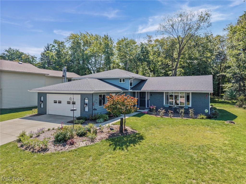 Step into this beautifully reimagined quad-level split, where nearly every detail has been thoughtfully updated with a perfect blend of quality and character. The open and inviting layout showcases fresh modern finishes while preserving the warmth and charm of the home's original design. The kitchen has been completely transformed with a center island, custom cabinetry, granite tops, wall oven/microwave combo & gas cooktop- ideal for both everyday living and entertaining! Vaulted living and dining areas feature abundant natural light, and the porcelain tile in the dining room is a showpiece in itself! A woodburning fireplace with insert flanked by built-in bookcases is the focal point of the lower level family room which also boasts a built-in entertainment center. A large laundry/mud room, 4th bedroom & half bath can also be found on this level. Upstairs, the spacious owner's suite boasts a walk-in closet & stylish ensuite bath w/dual sinks. Look for beautifully updated baths, modern laminate & luxury vinyl flooring & newer carpeting throughout most of the home. The finished basement features a rec room w/pool table & bonus room. Outdoors, the lot backs to an HOA-owned wooded area, giving you a serene backdrop, added privacy, and a rare connection to nature while you enjoy the rear patio. A drainage system was installed in the backyard to keep the yard usable year-round, too. High Point offers recreation amenities that include walking trails, an outdoor pool, tennis courts, playground & a clubhouse! A one year home warranty is also included. This is more than just a renovation, it's a home where craftsmanship meets comfort, ready for you to move right in and make it your own.