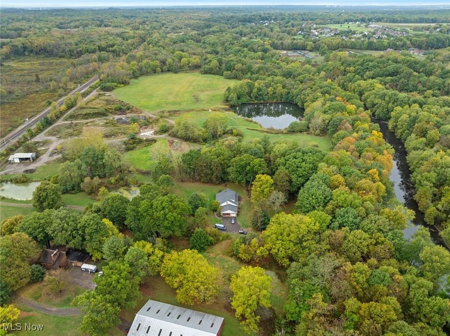 Discover over 20 acres on Middlebury Rd offering endless possibilities and unmatched privacy. This exceptional mixed-use parcel is surrounded by nature and bordered by historic parklands, placing you steps from the scenic Cuyahoga River Canal and its serene trail systems. Whether you're envisioning a private estate, recreational retreat, future development, or long-term investment, this property delivers rare versatility in a highly desirable location. With expansive wooded views, natural topography, and abundant wildlife, the land provides a peaceful haven while still offering convenient access to nearby communities, major roadways, and local amenities. Opportunities like this combining significant acreage, historical surroundings, and mixed-use potential are few and far between. Don't miss your chance to secure a remarkable piece of Northeast Ohio's landscape. Zoning and permitted uses to be verified by buyer. Appointment required before walking property.