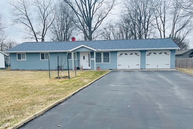 This beautifully remodeled 3-bedroom, 1.5-bath Ranch in Mentor-on-the-Lake offers effortless one-floor living with an open floor plan, extensive updates, and a spacious .46-acre lot. Ideally situated within walking distance of Lake Erie, this home features a finished attached two-car garage for added convenience. The stunning kitchen boasts a custom center island, brand-newer stainless steel appliances, new flooring, and modern fixtures, seamlessly opening to the inviting living room. A custom stone accent wall and electric fireplace create a warm and welcoming atmosphere. The primary bedroom provides direct access to the full bathroom, which conveniently connects to the first-floor laundry room for easy accessibility. All new flooring throughout, fresh neutral paint, ceramic tiled bathrooms, new back sliding door and more. The finished garage includes abundant storage solutions, with cabinets, shelving, and countertops already installed. Outside, enjoy the expansive backyard with a 16’x14’ concrete patio, perfect for relaxing or entertaining.
Additional updates include:
New Furnace & A/C (2021), HWT (2019), New Roof (2022), siding (2020), roof (2022), windows (2021)
City of Mentor on the Lake POS complaint.
This home is truly move-in ready and offers the perfect blend of comfort, style, and functionality!