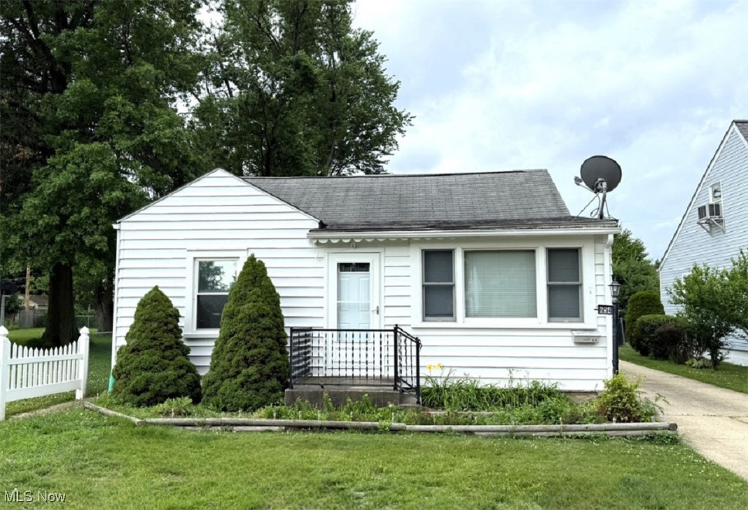 Welcome to this cozy Ranch home nestled in the heart of Eastlake, just minutes away from the beautiful shores of Lake Erie. This home has been very well maintained with lots of natural woodwork maintaining its original charm. The front of the home offers a bonus room which offers lots of natural light and built-ins and leads you to your spacious living room with hardwood floors. Updated light and bright eat in kitchen with newer appliances & ceramic tile floor. Two spacious bedrooms and a beautifully updated bathroom with newer pedestal sink, toilet & fixtures. Laundry area with utility sink - washer and dryer stay. Updated electrical and plumbing, newer doors, storm doors, vinyl windows, central air & hot water tank. Freshly painted throughout. Extra deep two car garage with a workshop at the rear includes hook up for a compressor. Extra deep fenced yard with a covered pergola (wired with electricity) great for relaxing or entertaining. Storage shed, garden and plenty of open space to be enjoyed as you wish. City Point of Sale Compliant! Home Warranty included. Move right in and make it HOME.