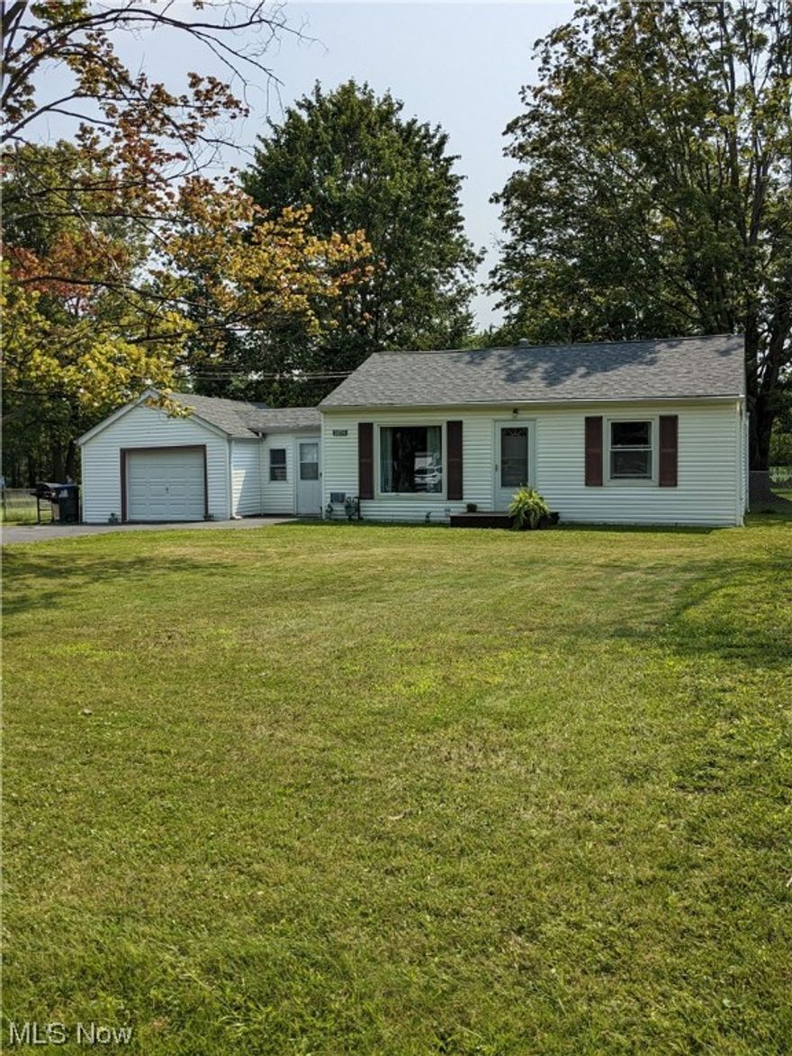 Well maintained charming 2-bedroom, 1 bathroom ranch sitting on .56 acres. Walk right into the breezeway where you have your washer and dryer hookup. This home has gas and electric hook ups with all appliances stay with the home and are in great condition! Updates are sump pump (2019), sewer line (2019), roof (2019), new purge motor on furnace (2019), and hot water tank (2022), new carpet (2022), and all newer drains throughout the home. Siding/windows (1999) and new sealer on the driveway (2022).  Newer concrete in garage and large fenced in backyard with shed.