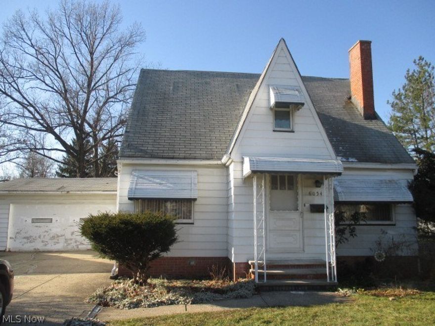 Spacious 3 Bedroom, 1 1/2 bath Cape Cod. Formal living room with fireplace and built ins. Large family room with bar area - great for entertaining! Central air. Features some newer vinyl replacement windows. 2 car attached garage. Nice yard with a deep lot. This one won't last!