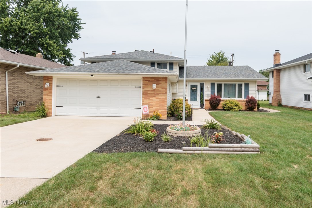 Welcome home to 5602 Hollywood Dr. in Parma where you, and this gorgeous listing are the STAR! Modern living in this stunning fully updated split level, which offers three bedrooms, two full baths, gorgeous relaxing 3 season enclosed patio, fireplace (professionally checked in 2023), fully fenced in back yard (privacy fence 2023-stained 2025), updated landscaping 2023, new front screen door 2025, Central AC, 2 car attached garage, turbine vents on roof installed 2023 (Roof 2021), newer HVAC approx 2021. All appliance estimated 2021 will remain, except washer and dryer. So many more bonuses - TV mount over fireplace stays, TV in 3 season room stays, green outdoor picnic table and chairs stay, Mini bar fridge stays, Wyze doorbell and Wyze Smart Thermometer all stay! Seller offering 1yr Home Warranty - APHW ($499 paid from seller).
Great Location - located near Ridgewood Golf course, Parma is building a new clubhouse/cafe within walking distance, near numerous other parks, restaurants, shopping, health care, and many other amenities. Move In Ready!!
Book your showing now as not to miss this gem. Welcome home to 5602 Hollywood Dr!