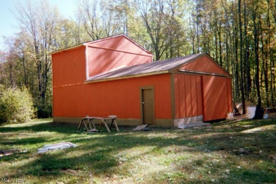 Rural acreage with newer Pole Building. Great opportunity for future building and  current storage. 24 X 40 Ft. Pole barn with loft can be great for boats, campers, farm equipment, building materials or other toys or tools until you decide to build or not. Rough drive started.  Pole building set back aprox 800 ft  in clearing.
Very private and serene setting.