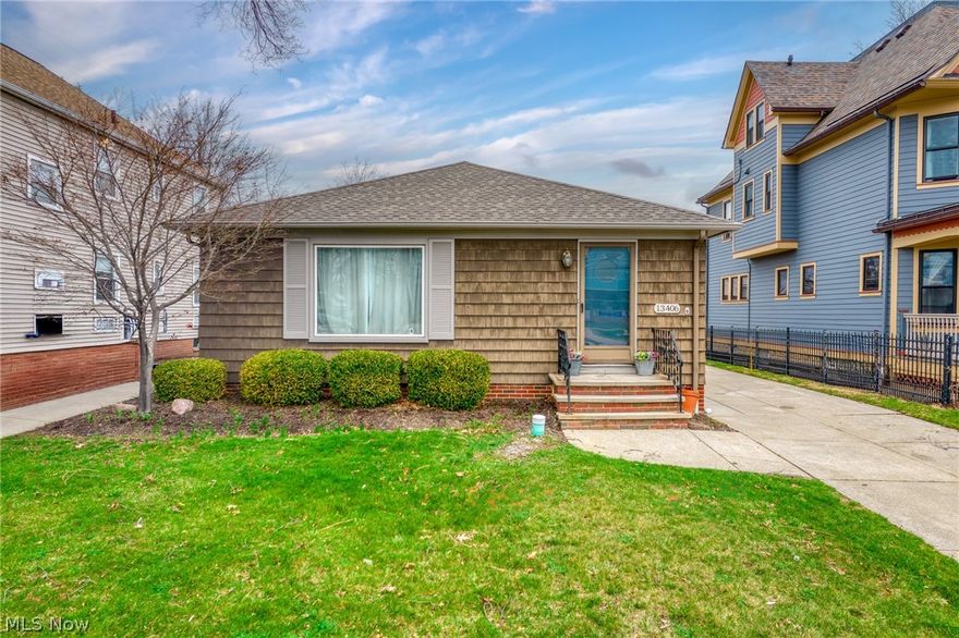 Charming, meticulously maintained ranch in the heart of Lakewood! Rare one story living in Lakewood, OH offers easy living paired with thoughtful updates and undeniable charm. From the moment you step inside, you’ll appreciate the inviting feel of the freshly painted interior and the neutral palette that complements the home’s bright and welcoming spaces. The main living area features comfortable newer carpeting while the two spacious bedrooms showcase beautiful hardwood floors and ample natural light. A generously sized eat-in kitchen provides abundant storage and functionality with updated counters and full suite of appliances, including a recently replaced refrigerator. Both bedrooms are well-proportioned and located near the full bathroom with beautifully tiled tub shower combination. The primary bedroom also offers direct access to a charming screened-in three-season room which is the perfect spot to enjoy morning coffee or unwind. The stairwell to the lower level offers abundant storage for practical everyday organization. Downstairs, the full basement has been professionally waterproofed and freshly finished in neutral tones, creating versatile space ideal for recreation, hobbies, storage, or a future more finished area. There have been many meaningful improvements over time, including but not limited to replacement of the sewer line, furnace, washer/dryer, and then more recent updates to the detached garage with a newer roof and fresh exterior paint. Exterior updates also include freshly painted shutters and front door and refreshed landscaping. Situated on a lovely Lakewood street, this home blends classic character with smart maintenance and upgrades, making it a wonderful opportunity for anyone seeking comfortable one-floor living in one of Northeast Ohio’s most beloved communities.