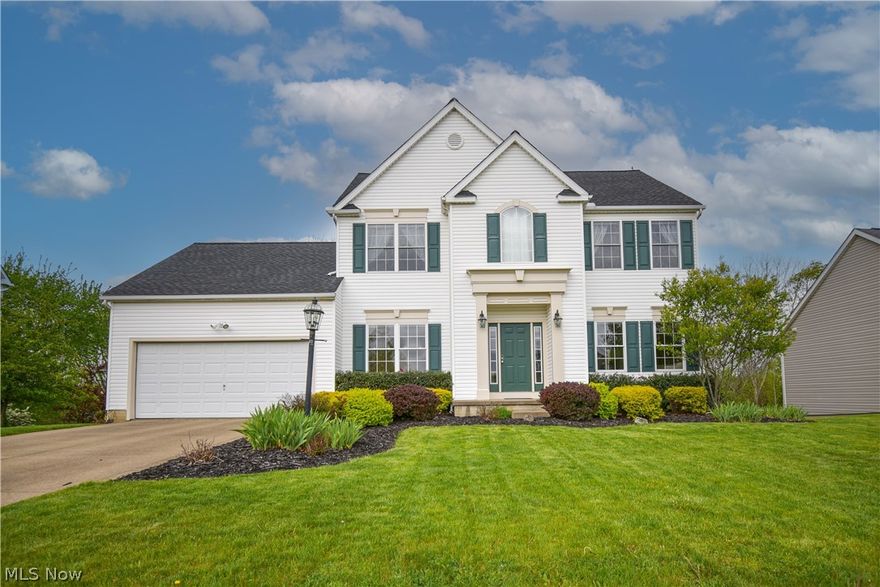 Welcome to this beautifully maintained 4-bedroom, 4-bath colonial located in the Northampton Highlands neighborhood, offering nearly 4000 square feet of finished living space and a fully fenced backyard. Step through the front door into a formal foyer featuring an open staircase. To the right, a bright living room flows seamlessly into the spacious family room, complete with a cozy gas fireplace. To the left, a versatile flex room with elegant pillars and a tray ceiling is currently used as a playroom but would make an ideal formal dining room or home office. The heart of the home is the expansive kitchen, boasting abundant cabinet and counter space, a center island with breakfast bar seating, and a pantry. A reverse osmosis system services both the kitchen sink and refrigerator line. Just off the kitchen, the sunroom provides the perfect setting for a breakfast nook or casual dining area, with sliding doors leading to the upper deck, ideal for grilling, entertaining, or simply enjoying views of the backyard and treed surroundings. Convenience continues on the main level with a half bath, laundry room, and access to the attached extended two-car garage with a third bay. Upstairs, the primary suite offers a vaulted ceiling, a walk-in closet, and a private en suite bath with a double-sink vanity, a walk-in shower, and a soaking tub. Three additional generously sized bedrooms and a full bath complete the second floor. The walkout lower level is designed for entertaining, featuring a large rec room, bar area, and plenty of space for game nights or watching your favorite teams. A sliding door leads to the lower patio, extending your living space outdoors. The basement also includes glass block windows, a half bath with a new vanity, and two storage rooms. Outside, enjoy a fully fenced backyard with a storage shed, while the property itself extends beyond the fenced area for added space and privacy. Recent updates include a new roof in 2025 and a hot water tank in 2022.
