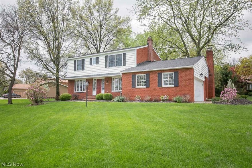 Fabulous Find! Heartwarming Retreat.  Your Family and Friends will Feel Welcome from the Moment They open the Door into the Foyer of this Center Hall Colonial.  Nestled on a Corner Wooded Lot, this 4 Bedroom, 2.1 Bath home is "Move in Ready" and just waiting for your personal touches.  The Formal Dining Room has a Wonderful Bay Window and Parquet Flooring.  It will be a Great Spot to host a Dinner for Two or a Large Family Gathering.  Steps Away is a Formal Living Room Surrounded with Windows bringing Nature In.  The Neutral Carpeting was recently installed.  The Eat in Updated Kitchen comes Complete with all Appliances and is Sure to Please "The Best of Chefs".  Step down to the Family Room Complete with a Fireplace and Parquet Flooring.  Open the door into a Sun filled 3 Season Room that steps out to a Brick Patio.  This will be a Great Spot to Host those Upcoming Cook Outs and Clam Bakes.  Upstairs is a Master Bedroom with a Private Bath and Three Additional Bedrooms.  The 2nd Floor