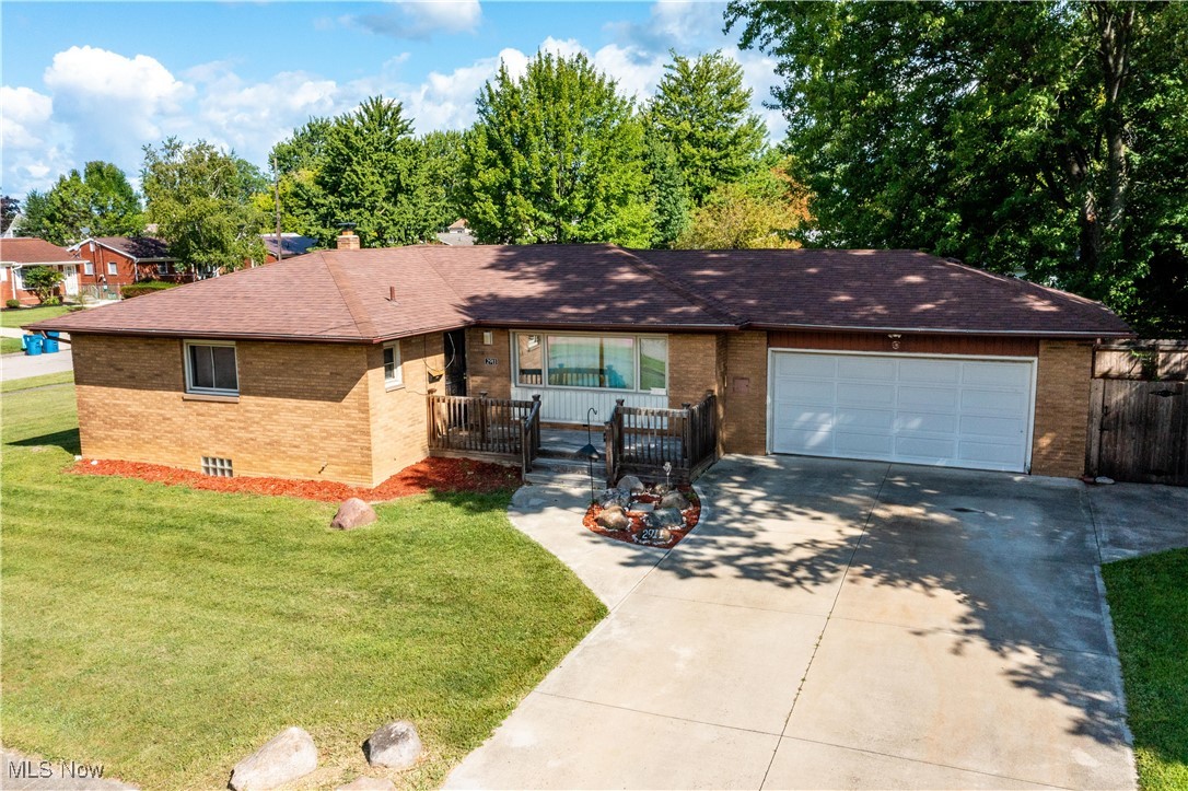 Welcome to your next home sweet home! This cheerful ranch is perched on a sunny corner lot in a quiet neighborhood where the neighbors are friendly, the evenings are peaceful, and yes—people really do wave when they walk by. Step inside and you’ll find gleaming hardwood floors that flow throughout much of the main level, paired with an abundance of windows that fill the home with natural light.
The master bedroom comes with its very own private half bath—perfect for those mornings when sharing just isn’t in the cards. A full bathroom is conveniently located on the main floor, and you’ll find another full bathroom in the basement, which is partially finished and absolutely sprawling. Whether you envision a movie lounge, game room, craft space, or just want somewhere to stash the treadmill you swore you’d use, this basement can handle it.
The attached 2-car garage isn’t just for parking—it’s a storage enthusiast’s dream. With shelving already in place (and staying!), you’ll have room for tools, toys, and maybe even that holiday décor collection that seems to grow every year. Practical updates? They’re already handled. A new roof was installed in 2021, the entire electrical system has been upgraded to grounded service, and the home has been fully insulated. Translation: comfort, safety, and energy efficiency are already baked in.
And let’s talk about water—you’ll be spoiled with a Culligan purification system complete with reverse osmosis, so you’ll enjoy some of the purest drinking water around. The kitchen is equipped with newer appliances too, so you can skip the “replace everything” phase and get right to cooking.
With its thoughtful updates, friendly neighborhood, and bright, comfortable spaces, this home is more than just a house—it’s the kind of place where you can settle in, relax, and make it your own. Come take a look… just be prepared to fall a little bit in love.