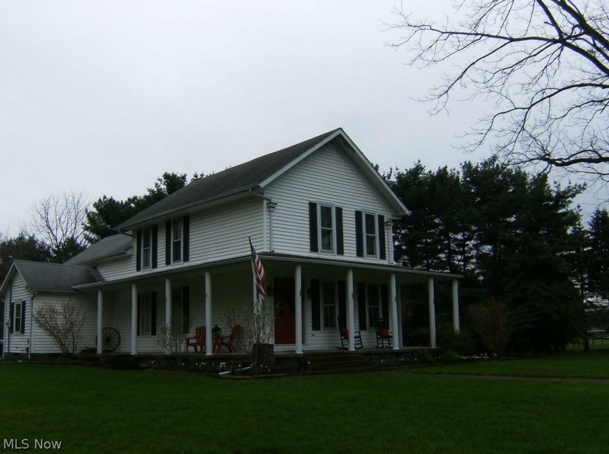 One of original homes in Amherst, built for the Quarry Master. Fantastic cub appeal. Pillared wrap porch. Large custom eat-in kitchen with center island, French doors to separate formal dining area - living area with fireplace. Kitchen also opens to family room with vaulted ceilings. Open staircase, original woodwork. Updated baths, master bedroom and bedroom has walk-in closets. 40x30 barn w/new roof for storage and c cars. Outside fire pit. Beautiful property - 2 tiered deck.