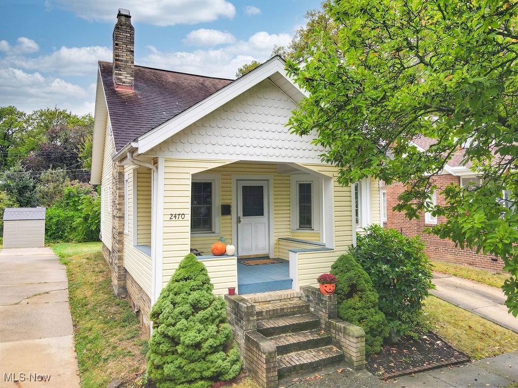 Welcome to this charming and spacious Cape Cod nestled in the heart of Cuyahoga Falls. This home offers a warm and inviting floor plan with two comfortable bedrooms on the main level and a stunning owners suite that spans the entire second floor, complete with hardwood flooring and a cozy fireplace. The formal dining room is filled with natural light from the bay window, while the living room features a beautiful fireplace and striking exposed wood-beam ceiling for added character. Hardwood floors extend throughout the home, currently protected under carpeting, offering endless potential to make the space your own. Perfectly situated just minutes from the Riverfront, shopping, dining, and easy highway access, this home combines classic charm with a fabulous location! Schedule your showing today!!!
