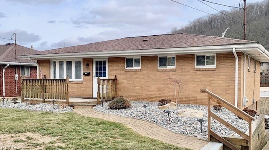 Welcome home to this charming 3 bedroom, 2 bathroom home in the desirable Walton Acre Subdivision perfect for starting out, starting over or downsizing. This well -maintained property features a private driveway leading to a spacious covered patio/carport area, ideal for outdoor entertaining and everyday convenience. The home comes fully equipped with kitchen appliances and offers additional living space in the lower level, including a second kitchen area with refrigerator, bath and recreation room-perfect for entertaining or an in law suite. Enjoy springtime as new perennials bloom in the beautifully landscaped yard, creating a peaceful and inviting setting. The home is conveniently located close to the Toronto City Schools campus, with easy access to Ohio State Route 7 and many essential amenities, shopping and dining.