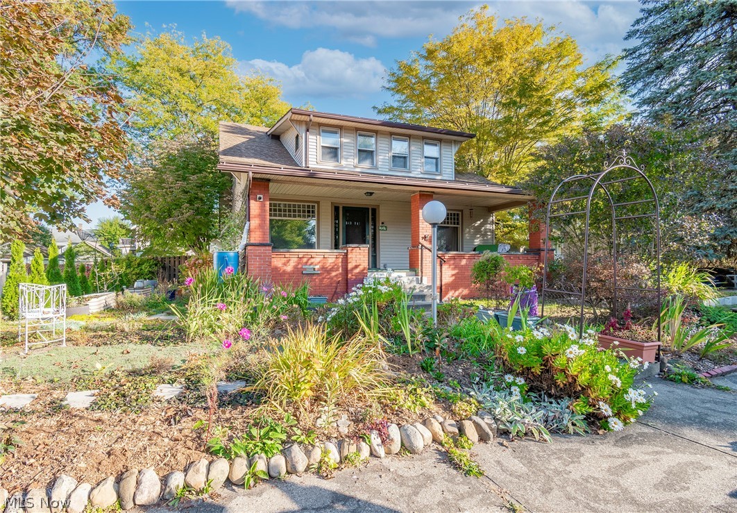 Welcome to 1207 21st Street! This character-filled conventional home boasts 4 bedrooms, 2 full bathrooms, and over 2,200 sq ft! You will be greeted by a beautiful double door foyer and continue into a sizable living room with a fireplace and conveying mounted tv. The main level features large windows, original woodwork, and hardwood flooring throughout. Also on the main level are two bedrooms, a full bathroom, and an eat-in kitchen that grants access to a side deck. Upstairs you will find an oversized hallway large enough for a sitting area with an attached attic space for storage. The two remaining large bedrooms each have an extended space that can be used as offices, closets, or reading nooks. Your gorgeous second full bath rounds out the upper level. Outside you will find loads of gardening areas, a 2 car detached garage, and fully fenced in backyard! Don't miss your opportunity to own this home. Schedule your private viewing today!