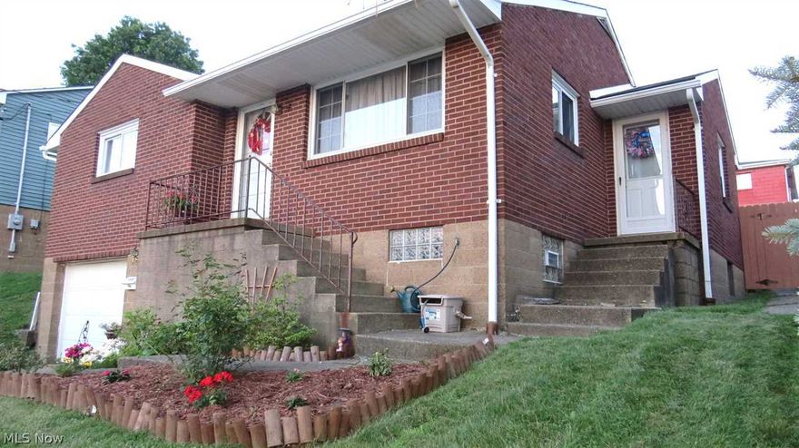 THE KEY TO YOUR FUTURE...opens the front door of this 3 bedroom,2 bath brick ranch on Weirton Heights. Great features include an engaging living room, accessible and spacious eat-in kitchen and beautiful finished rec rm with bath. 1 car garage, central air and fenced in back yard.  Open that door today!
