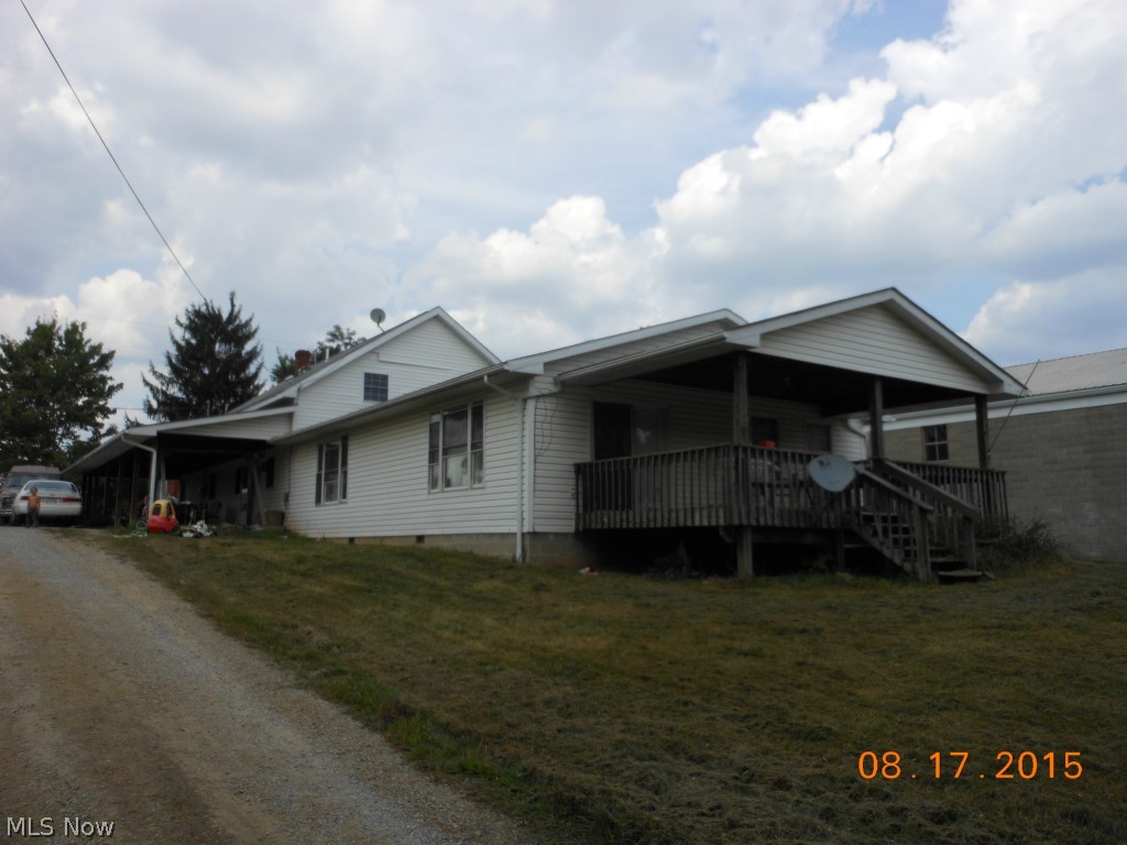 Originally one room school house built in late 1800's and added on and remodeled by plumbers/pipefitter to make this spacious 11 room 5 bedroom home. The 9 tax parcels total approx. 3.8 Acres Features a 1/2 basement and 1/2 crawl space. Propane gas furnace plus a heat pump serve home. Just 2+ mi from I-70 Exit #186 & SR 285. Additional parcels: 44-000583.000, 44-0000585.000, 44-0000587.000, 44-0000588.000, 44-0000608.000, 44-0000610.000, 44-0000612.000, 44-0000614.000. Old Republic Home Warranty Included.