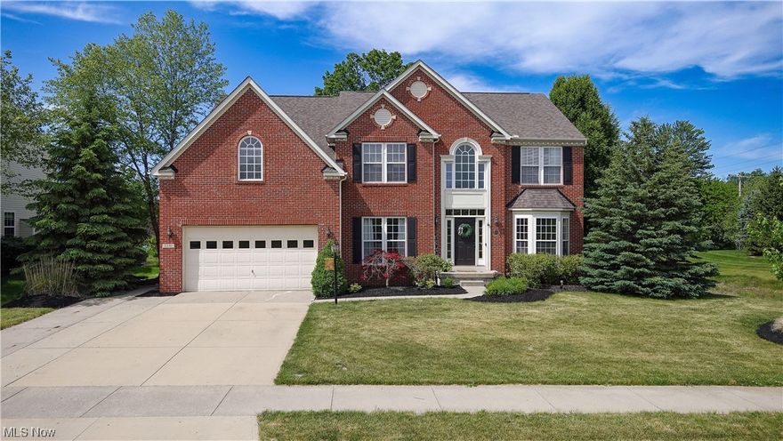 Welcome home to this former model home that has over 4800sf in the Twinsburg school district! This exceptional property boasts of an impressive range of features and amenities that make it the perfect home for your family. You'll be greeted by the two-story foyer with wood floors. There is a dining room to the left and a living room to the right. Enjoy a two-story family room with a floor-to-ceiling stone, gas fireplace and opens to an eat-in, gourmet kitchen. There are granite countertops, large island with breakfast bar and a morning room that has an abundance of natural light. The second floor is comprised of a cat walk that overlooks the family room, a primary bedroom that has a tray ceiling and en-suite bath that includes double vanities, soaking tub, separate shower, and TWO large, walk-in closets. The remaining three bedrooms on this floor are generously-sized, have walk-in closets and share a full bathroom. The finished lower level offers additional living space, with a large r