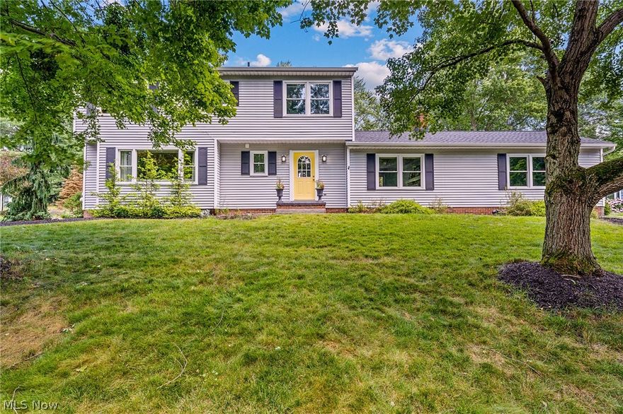 Spectacular location on a quiet street, walking distance to downtown historic Hudson and Hudson City Schools. This home offers many updates and comforts with four bedrooms and two and half baths. A bright foyer makes way to a more open concept living space with large family room with wall of built-ins and many windows just steps away from the eat-in kitchen and dining room. An island with additional seating, plus pantry wall makes a perfect space for entertaining. Step down den, powder room and first floor laundry complete the first floor. Upstairs you'll find a spacious owners suite with private bath and double closets. Three additional sunny bedrooms share the updated hall bath. You won't want to miss the finished lower level for added space and storage and the private backyard is waiting for you. Schedule your private tour today!