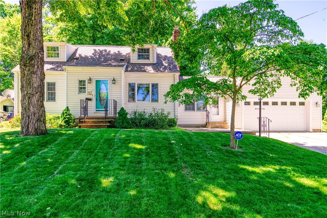 Welcome Home! This Charming Cape Cod on a quiet tree-lined street has been lovingly maintained by the same family since 1957! Situated on a beautiful double lot featuring 4 Bedrooms, 2 Full Baths and offering tons of living space...this is the one you have been waiting for! Large Living Room with a bright picture window! Spacious, fully applianced Eat-in Kitchen! Breezeway with built-ins opens to a rear porch that overlooks the private, parklike backyard. 2 bedrooms and a full bath with walk-in shower complete the 1st floor. Upstairs, you will discover 2 huge bedrooms and an additional full bath. Hardwood flooring under the carpet on the 1st & 2nd floors except for Kitchen and Bathrooms. The finished lower level includes a rec room with fireplace, craft/play room or office, and tons of storage space! 2 car attached garage! Updates include: Vinyl Siding, Anderson replacement windows, roof is less than 10 years old, Furnace and A/C (2010), and the hot water tank (2017). Great bones...ready for your decorator's touch! Hurry...this one will not last!