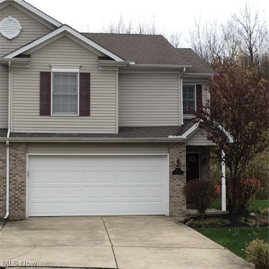 Gourmet kitchen, custom cabinets, marble countertops, stainless appliances.  Tiled bathroom, double sinks and duel shower heads.  Private unit with deck that overlooks pond and woods.  Fireplace in living room with open kitchen/dining area.  Finished lower level with included third bedroom.  Move in ready and maintenance free.