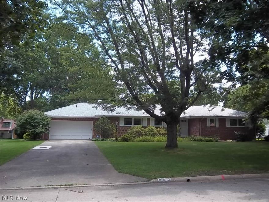 Great brick ranch with neutral colors, 2 car attached garage & newer A/C.