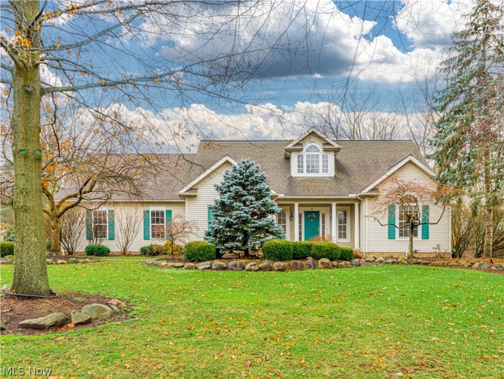 This charming Hudson Ranch is situated on a lovely .75 acre lot and located in the heart of Hudson within walking distance to the Historic District offering a wide variety of dining, shopping and community events year round. This one of a kind, custom built home with over 4000 sq ft of living is bright and open with soaring ceilings and skylights throughout filling the home with plenty of natural light. The impressive foyer entry leads to the formal living room and sun room that share a double sided fireplace. The foyer, spacious eat in kitchen and formal dining room are tastefully done with Witek ash wood flooring. The first floor has a lovely master suite plus two more bedrooms, one of which is currently used as an office w/ built in cabinets and desk. The walk out lower level is also well lit with 7 windows and two sliders to the outside. The 32 x 28 family room with hardwood floors has a fireplace, a kitchenette , two more generous sized bedrooms or bonus rooms plus a full bathro