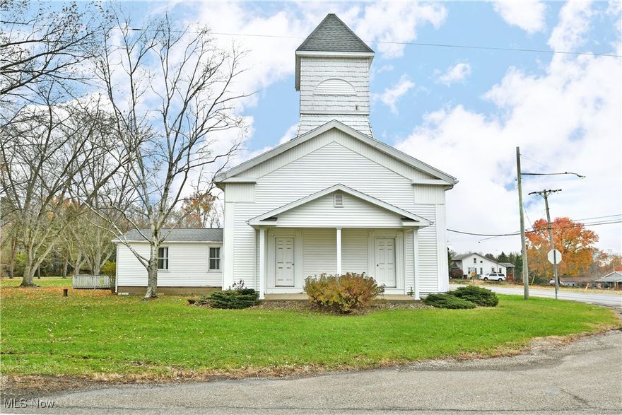 A rare opportunity in Fowler Township, this picturesque countryside church offers timeless character, exceptional functionality, and outstanding potential for a variety of uses. Perfectly situated with quick, direct access to State Route 11, the property provides convenient travel.
The building stands as a recognizable local landmark, crowned by its tall steeple and classic architectural lines. A mobility-friendly ramp leads to a welcoming foyer that includes bathroom facilities and utility access. The bright, open sanctuary features a split-nave layout, three rows of seating, dual front entrances, and clean sightlines—an ideal foundation for continued worship, community gathering, educational programs, or a creative repurposing project.
Outside, the church is supported by generous rear parking, accommodating visitors, members, or event guests with ease. The structure’s straightforward design makes it adaptable for transformation into a studio, office, event venue, workshop, or unique residential concept (buyer to verify zoning).
With its peaceful rural setting, strong visibility, and close proximity to major roadways, this Fowler Township church presents an exceptional standalone opportunity—perfect for those seeking a functional building with charm, flexibility, and room for inspired vision. Schedule your showing today and explore the possibilities! Electrical updated December 2025