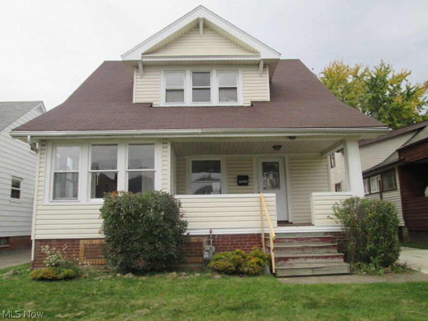 Plenty of old world charm in this three bedroom vinyl sided colonial. Spacious living room with decorative fireplace and natural woodwork. Formal dining room with window seat and natural wood work. Eat-in kitchen. Den. Enclosed rear porch. Full basement with extra bath. Central air for those hot summer days. One car detached garage. Plus more! Great location, near shopping, schools, parks, public transportation and major highways. This home could be gorgeous with some paint, carpet and a little TLC!