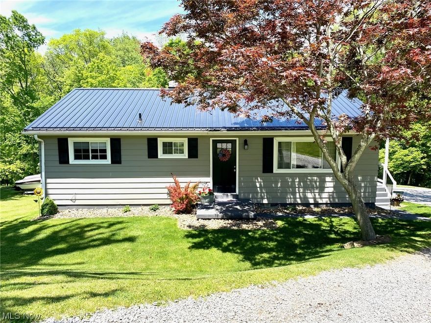 Welcome to this charming 3-bedroom, 2-bathroom home nestled on a spacious .70-acre lot. With a total area of 1040 square feet, this residence offers a comfortable and inviting living space.The property underwent significant updates in recent years, ensuring a modern and well-maintained atmosphere. In 2019, new windows were installed throughout along with new front door, enhancing energy efficiency while flooding the interior with natural light.Further improvements were made in 2022, including a brand new metal roof and wood deck.  The addition of the deck creates an excellent outdoor entertainment area, perfect for hosting gatherings. The property also offers a finished rec-room, providing additional space for relaxation, hobbies, or entertaining guests. Situated on a generous .70-acre lot, this property offers ample outdoor space for various activities and possibilities.