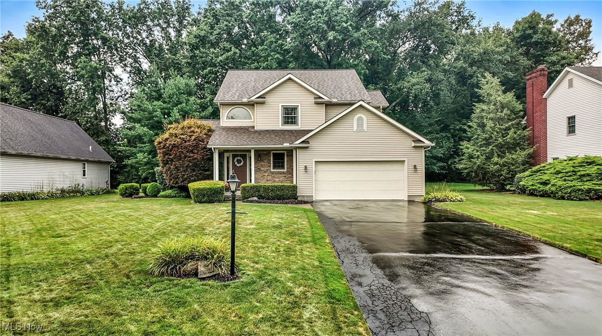 Welcome to your dream home in one of Howland's most desirable neighborhoods! This meticulously maintained, one-owner residence offers a perfect blend of comfort and style with 3 generous bedrooms, 2.5 bathrooms, and an oversized attached 2-car garage for additional storage. The inviting two-story foyer and open living areas make this home a must see! The kitchen features granite countertops, a modern backsplash, stainless steel appliances, a generous pantry, and vaulted ceiling. The great room, adjacent to the kitchen, has a gas fireplace and full wall of windows offering great natural lighting. The current den on the first floor could also serve as a formal dining room, if desired. Additionally, the first floor office has plumbing for a laundry room, if a first floor laundry is a must. There is also a conveniently located half bath on the first floor. Retreat to the upstairs where the primary bedroom boasts a spacious walk-in closet and a luxurious ensuite bathroom complete with a soaking tub and a separate shower. Two additional spacious bedrooms have great closet space and an additional full bath. The finished basement has a large great room and bar area as well. Step outside to your private backyard sanctuary, where you’ll find a beautifully landscaped yard featuring a large private patio, perfect for relaxing and enjoying the outdoors. Additional highlights include a new roof in 2023, new furnace in 2017, new washing machine in 2025, and stamped concrete patio in 2018. Don’t miss out—schedule your showing today and make this exceptional property yours! A one-year home warranty is included for added peace of mind.
