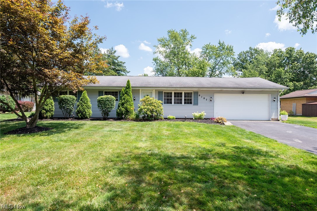 Completely updated one floor living in Macedonia! This fully renovated and well maintained home offers open floor plan living with a stunning remodeled kitchen with stainless appliances and a walk in pantry. Sunny living room opens to the dining area with sliders out to the charming back yard. Remodeled full bath down the hall with 3 generously sized bedrooms. Primary bedroom with ample closet space and a full private en suite bath! Mudroom/laundry/drop zone connects the attached garage to the kitchen, great for busy modern living! Outside you'll enjoy an extra large almost half acre lot, perfect for entertaining with a sprawling patio and fire pit. Thoughtful mature landscaping and a large shed for storage. This home is absolutely move in ready! Furnace, A/C, tankless hot water, LVT floors, carpet, kitchen, bath and laundry all renovated in 2017. Kitchen appliances all 2017 and washer and dryer new in 2020. Smart Garage door.