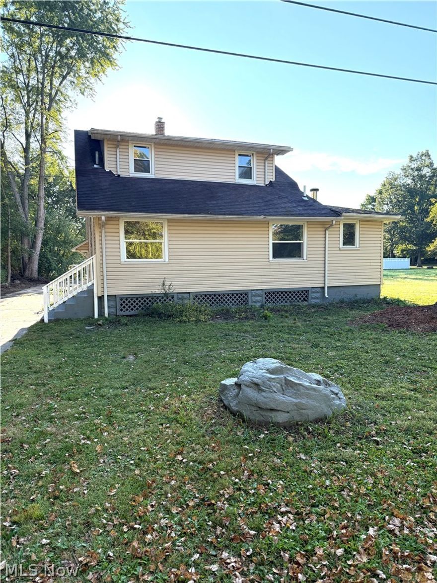 Welcome to this beautifully updated three-bedroom, two-bathroom home that blends modern living with the charm of a spacious hobby farm. Located in a peaceful area, this property is perfect for those seeking a move-in and ready home with plenty of room to grow. Inside, you can find a great room with a cozy fireplace. The new kitchen features sleek, modern appliances and offers plenty of counter space. Both bathrooms have been completely renovated. The first-floor laundry is a bonus. Outside, the property includes a garage with a small barn, perfect for a hobby farm, gardening, or additional storage space. A peaceful porch spot to unwind. Don't miss out, make this your home!