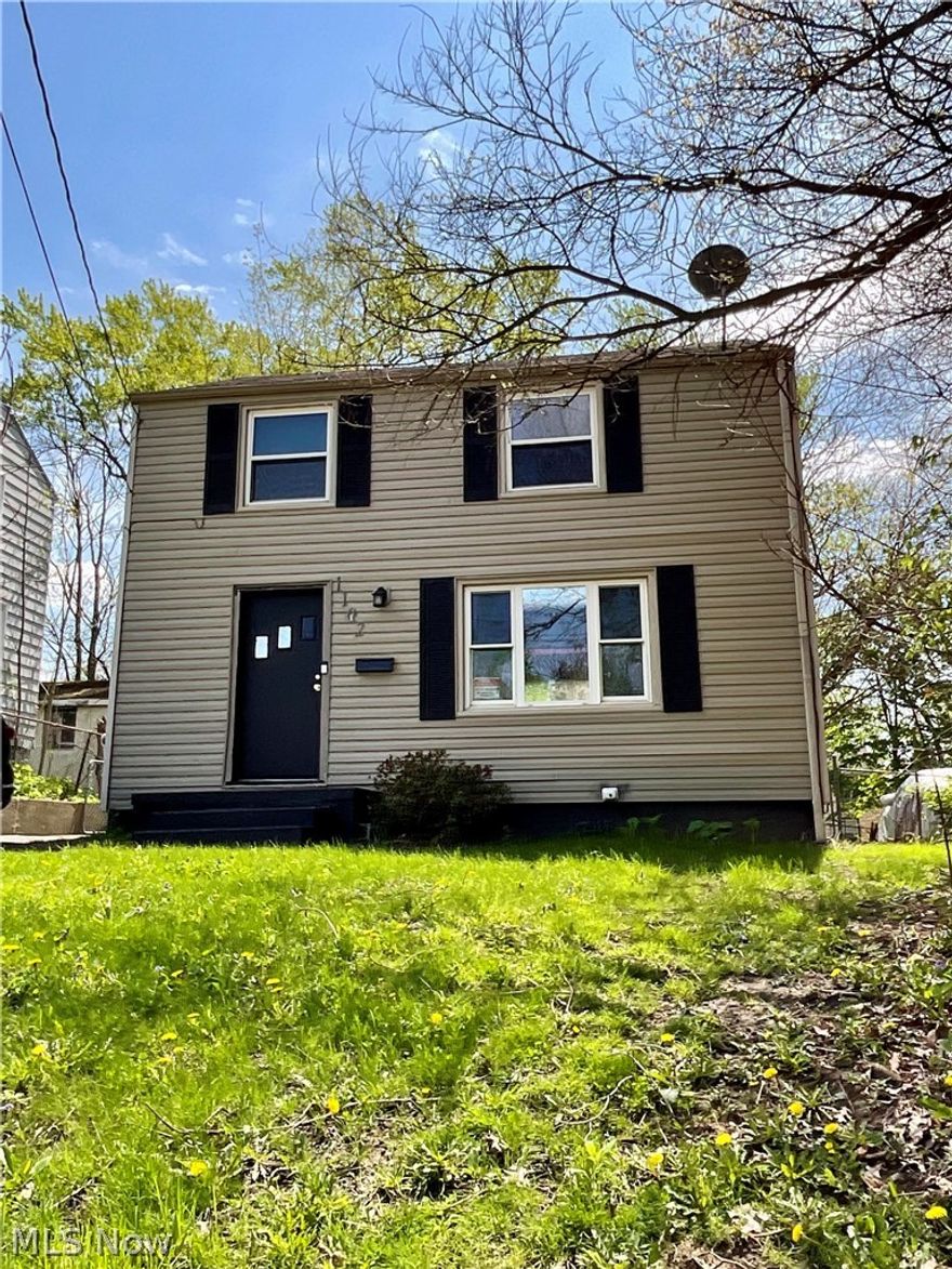 Welcome to 1102 Tonawanda Avenue! Located in the Goodyear Heights neighborhood- This Colonial-style home features a balanced design and vinyl siding for a clean, well-kept look. Black shutters accent the windows, and a matching front door adds a bold focal point. Inside, a traditional living and dining room feature stained hardwood floors, with appliances included and central air conditioning for added comfort. The dining room opens through double doors to a back porch, leading to a large backyard perfect for outdoor activities and entertainment. Upstairs offers three bedrooms and one full bathroom. The home is tenant-occupied, total rent: $1,148 with AMHA paying $1,081 per month. Tenant pays all utilities. Month-to-month lease begins at the end of May, offering flexibility for potential buyers or investors. HWT (2020) Cash on Cash ROI approx 11.9% (solid cash flow). Schedule your showing today!