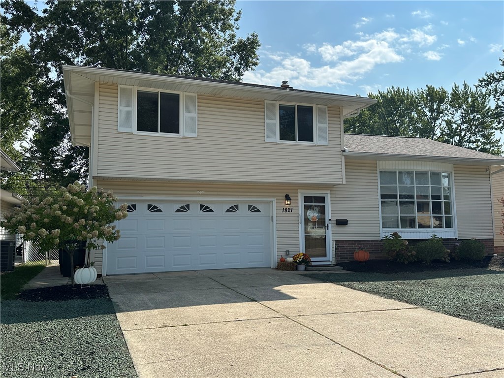 Absolutely beautiful three-level split on a quiet cul-de-sac! Updated kitchen with white soft-close cabinets, granite counters, island with seating, and newer stainless appliances. Open floor plan to dining and living room with new lighting and flooring. Three bedrooms with laminate floors, ceiling fans, and ample closets. Remodeled bath with tile shower/tub combo. Spacious family room for entertaining. Huge fenced yard with deck and patio. Two-car attached garage. Roof (2020), Furnace & A/C (2023). Impeccably maintained and move-in ready!
