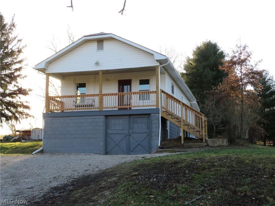 Convenient location on this 2 or 3 bedroom home with lots of new: kitchen cupboards, back splash, counter tops, flooring, windows, lights, bathroom vanity, and a new front porch. Nice, relaxing back yard. The living room and bedrooms have hardwood floors. There is a Jack and Jill bath between the bedrooms.