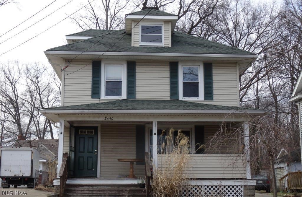 Cuyahoga Falls colonial, great location! Appears to have some larger updates including roof, electric, furnace, HWT, windows, patio door. Wood burning fireplace and hardwood floors. Needs some TLC, restore this beautiful home!